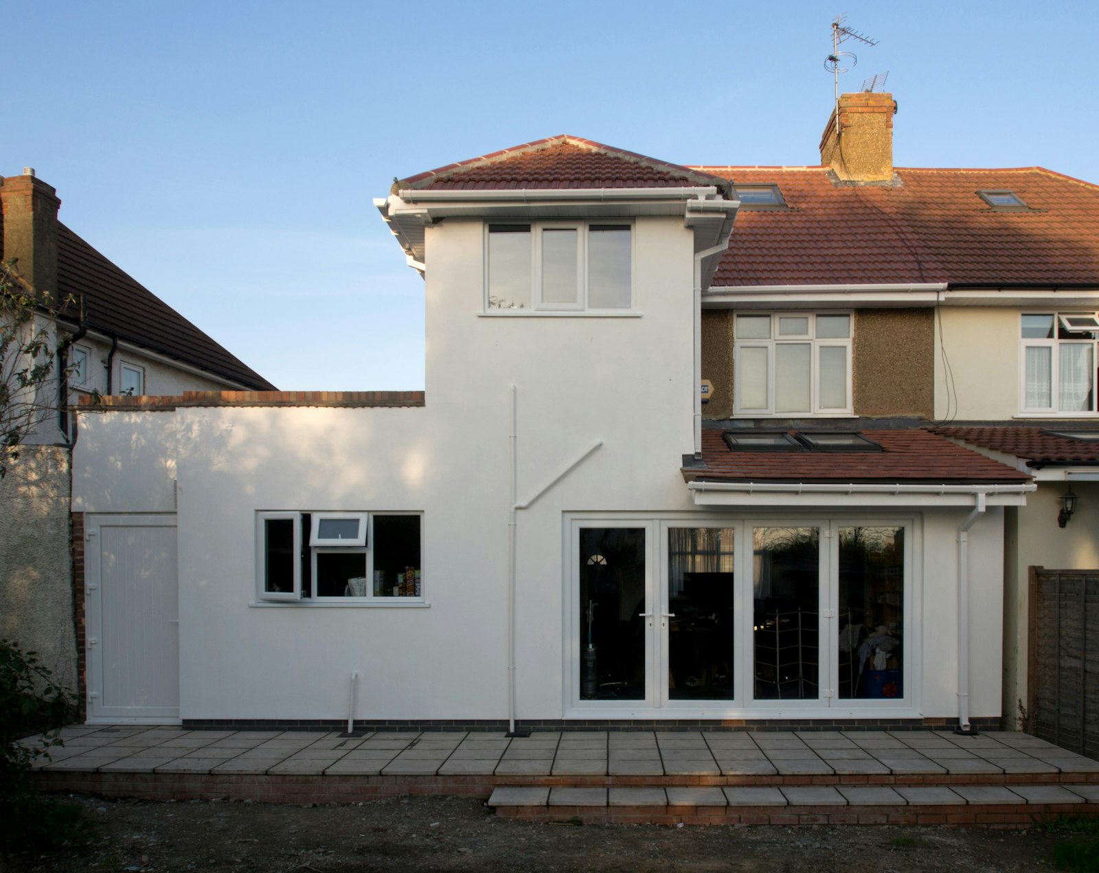 Finished rear extension with bi-fold doors on a semi-detached house