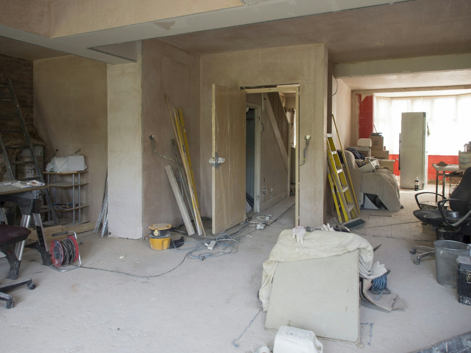 Freshly plastered interior of a house mid-refurbishment